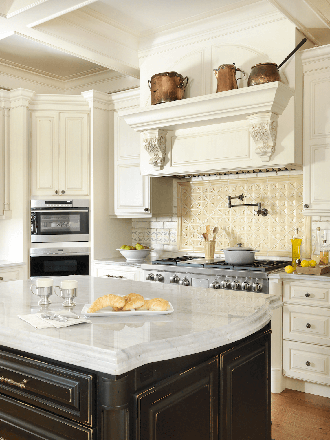 A Cook's Kitchen - Traditional Range Hood with Double Ovens by Beck/Allen Cabinetry