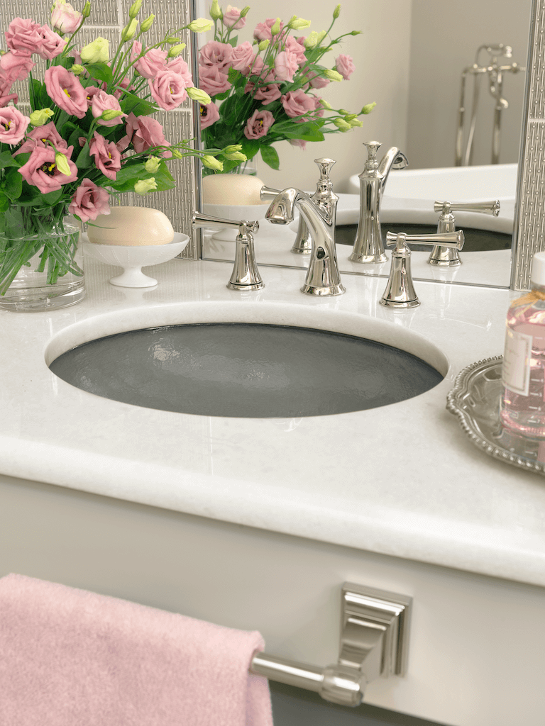 Bathroom Design Ideas | Detail shot of an elegant master bath featuring Naxox marble countertop, Sonoma hand-made tile and glass Kohler sink.