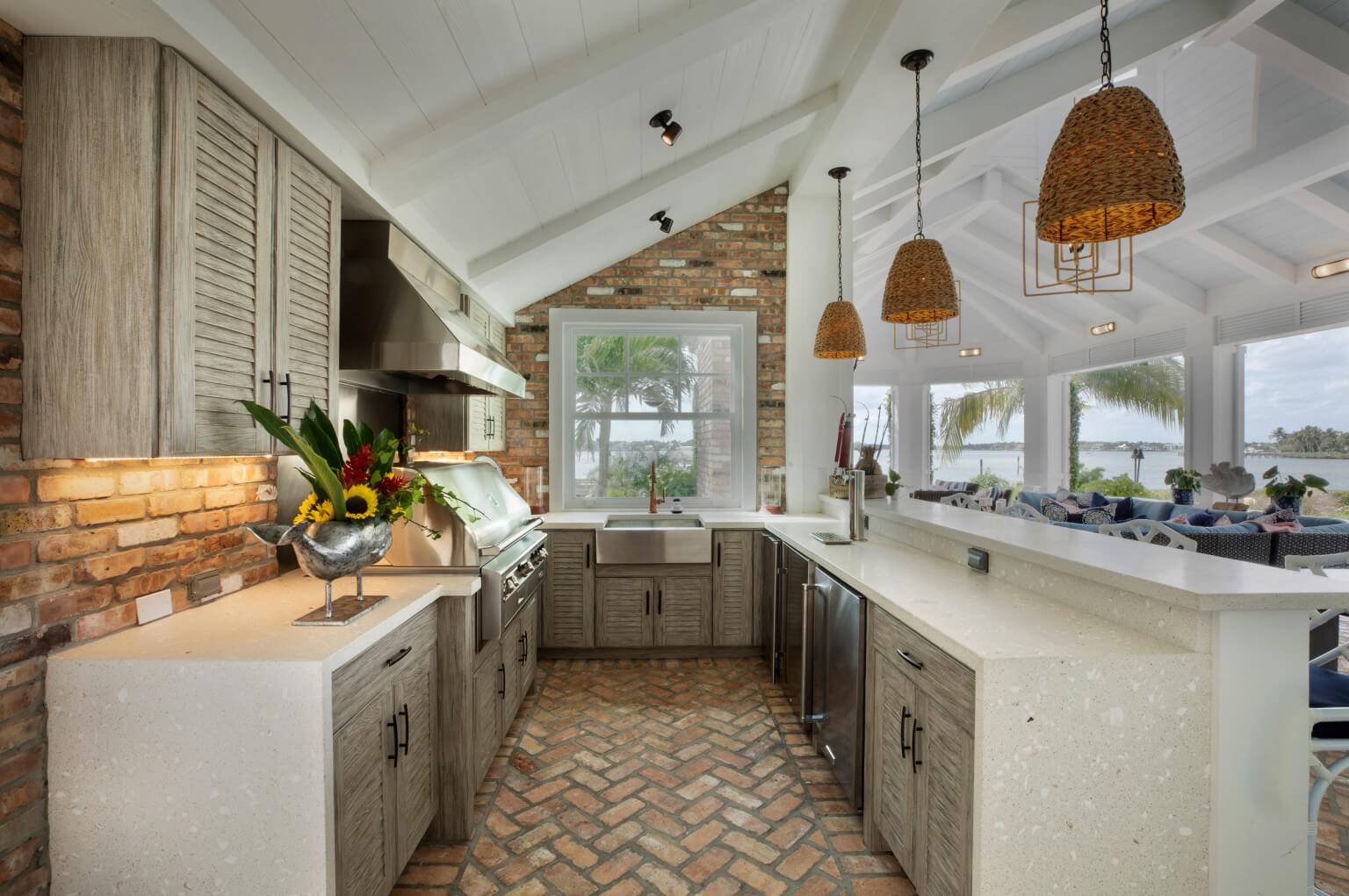 NatureKast outdoor kitchen cabinets are 100% weather resistant and are available in a wide range of styles and mimic the beauty of natural wood.