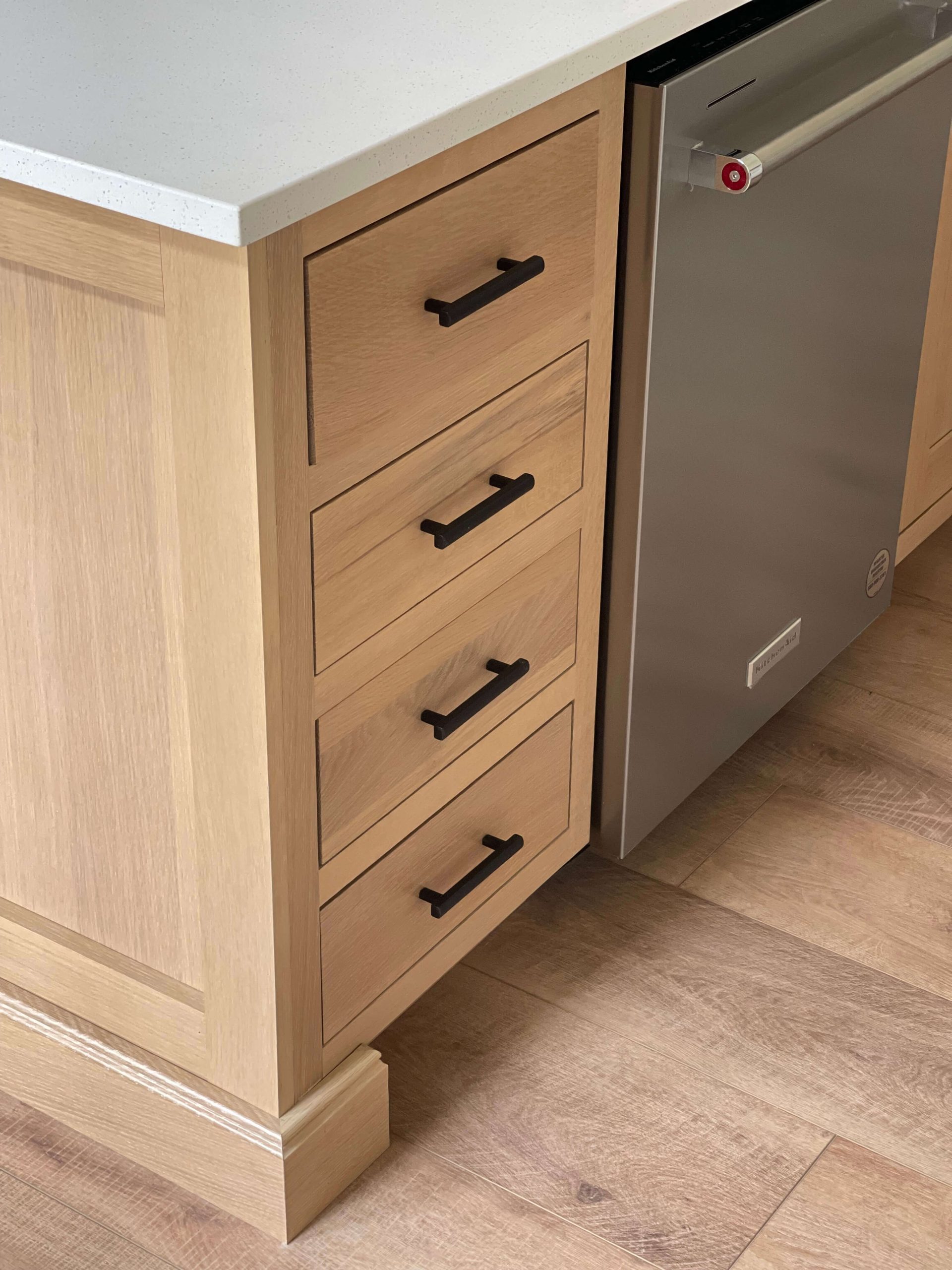 Kitchen island, inset quarter sawn white oak cabinetry by Beck/Allen